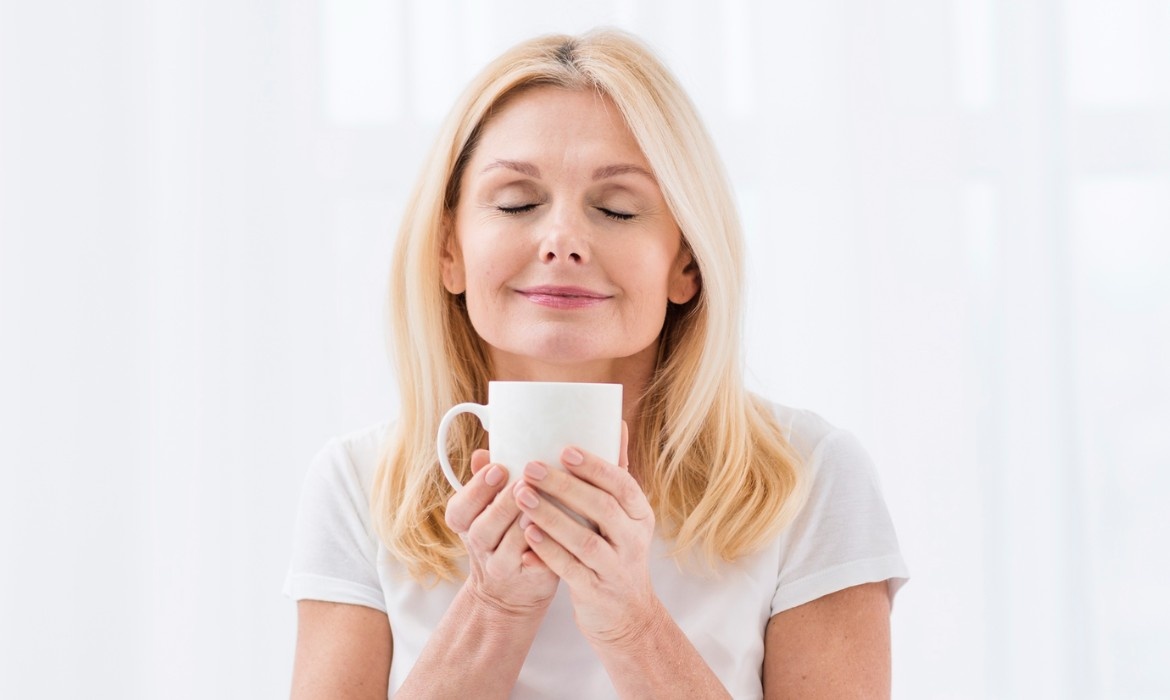 Woman enjoying cofee 2 